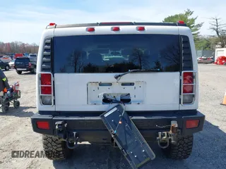 2006 Hummer H2 with VIN 5GRGN23U86H104660, listed as a IAAI auction lot 41933116 with 165,734 mi miles. Bid and sale history available at carsss.com. Image 16.