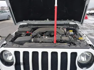 2021 Jeep Wrangler Unlimited Sport Altitude with VIN 1C4HJXDG2MW791599, listed as a IAAI auction lot 41235427 with 47,220 mi miles and . Bid and sale history available at DreamBid. Image 10.