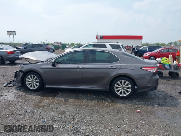 2020 Toyota Camry LE with VIN 4T1C11AK1LU328682, listed as a IAAI auction lot 41966816 with 172,334 mi miles and . Bid and sale history available at DreamBid. Image 14.