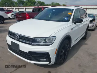 2021 Volkswagen Tiguan SE with VIN 3VV3B7AX9MM003432, listed as a IAAI auction lot 41914477 with 64,530 mi miles and . Bid and sale history available at DreamBid. Image 18.