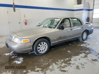 2006 Ford Crown Victoria LX z VIN 2FAFP74V76X154418, wystawiony jako Copart lot #88023345 z przebiegiem 136 580 mil mil oraz Tytuł czysty. Historia ofert i sprzedaży dostępna na DreamBid. Obrazek 1.