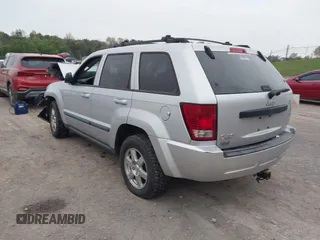 2009 Jeep Grand Cherokee Laredo with VIN 1J8GR48K09C557139, listed as a IAAI auction lot 41994604 with 1 mi miles. Bid and sale history available at carsss.com. Image 3.