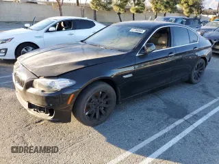 2014 BMW 5 Series 535d with VIN WBAXA5C5XED690644, listed as a Copart auction lot 87766865 with Not Provided miles and Clean Title. Bid and sale history available at carsss.com. Image 1.