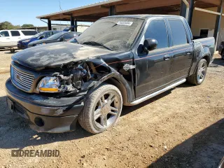 2002 Ford F-150 Harley Davidson with VIN 1FTRW07332KD46296, listed as a Copart auction lot 76333404 with 160,616 mi miles and Salvage Title. Bid and sale history available at carsss.com. Image 1.