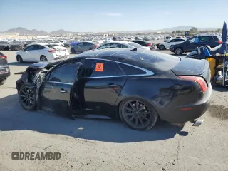 2015 Jaguar XJ z VIN SAJWA1CZ9F8V86796, wystawiony jako Copart lot #76458134 z przebiegiem Nie podano mil oraz Szkoda całkowita • Salvage title. Historia ofert i sprzedaży dostępna na DreamBid. Obrazek 2.