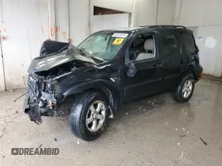 2006 Mazda Tribute LX with VIN 4F2YZ94126KM14426, listed as a Copart auction lot 85331974 with 214,950 mi miles and Salvage Title. Bid and sale history available at carsss.com. Image 1.