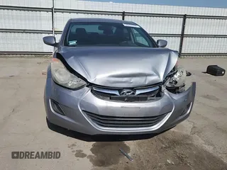 2013 Hyundai Elantra GLS z VIN KMHDH4AE3DU731009, wystawiony jako Copart lot #58668335 z przebiegiem 213 093 mil mil oraz Szkoda całkowita • Salvage title. Historia ofert i sprzedaży dostępna na DreamBid. Obrazek 13.