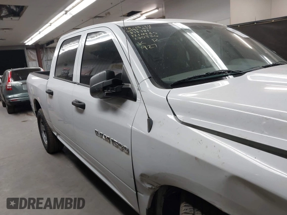 2012 Ram 1500 Tradesman with VIN 1C6RD6KP2CS280836, listed as a IAAI auction lot 40880119 with 84,748 mi miles and . Bid and sale history available at DreamBid. Image 13.