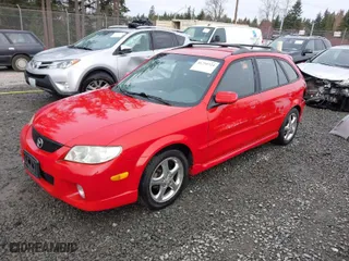 2002 Mazda Protege5 with VIN JM1BJ245221591260, listed as a IAAI auction lot 41755724 with 228,715 mi miles. Bid and sale history available at carsss.com. Image 2.