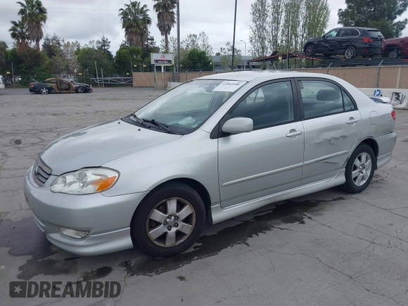 2003 Toyota Corolla CE with VIN 1NXBR32E43Z009933, listed as a IAAI auction lot 42064980 with 153,432 mi miles and . Bid and sale history available at DreamBid. Image 2.