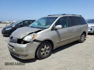 2004 Toyota Sienna XLE with VIN 5TDZA22C14S163122, listed as a Copart auction lot 59369065 with 221,591 mi miles and Salvage title. Bid and sale history available at DreamBid. Image 1.