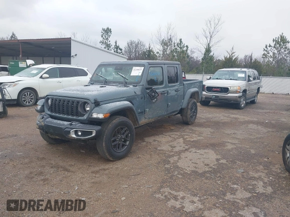 2024 Jeep Gladiator Sport z VIN 1C6HJTAG5RL127973, wystawiony jako IAAI lot #41248039 z przebiegiem 2 648 mil mil oraz . Historia ofert i sprzedaży dostępna na DreamBid. Obrazek 2.
