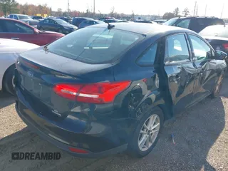 2015 Ford Focus SE with VIN 1FADP3F25FL384068, listed as a IAAI auction lot 40994199 with 1 mi miles. Bid and sale history available at carsss.com. Image 4.