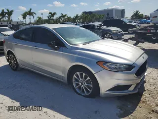 2017 Ford Fusion SE z VIN 3FA6P0H77HR146663, wystawiony jako Copart lot #56322425 z przebiegiem 77 361 mil mil oraz Tytuł czysty. Historia ofert i sprzedaży dostępna na DreamBid. Obrazek 4.
