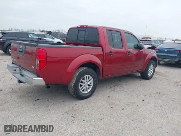 2014 Nissan Frontier SV with VIN 1N6AD0ER7EN765231, listed as a IAAI auction lot 41932925 with 110,021 mi miles and . Bid and sale history available at DreamBid. Image 4.