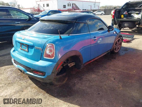 2013 MINI Coupe S with VIN WMWSX3C55DT466604, listed as a IAAI auction lot 42033723 with 109,814 mi miles and . Bid and sale history available at DreamBid. Image 4.