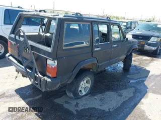 1995 Jeep Cherokee Sport with VIN 1J4FJ68S5SL541413, listed as a IAAI auction lot 42722408 with 335,432 mi miles and . Bid and sale history available at DreamBid. Image 4.