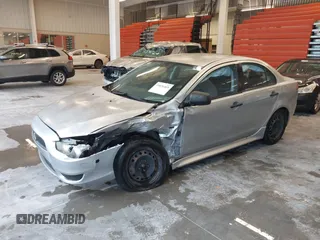 2010 Mitsubishi Lancer DE with VIN JA32U1FU3AU019390, listed as a IAAI auction lot 39876469 with 188,617 mi miles. Bid and sale history available at carsss.com. Image 2.