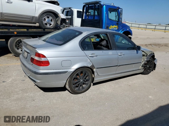 2003 BMW 3 Series 330xi with VIN WBAEW53413PG09450, listed as a Copart auction lot 74111954 with 252,295 mi miles and Salvage Title. Bid and sale history available at carsss.com. Image 3.