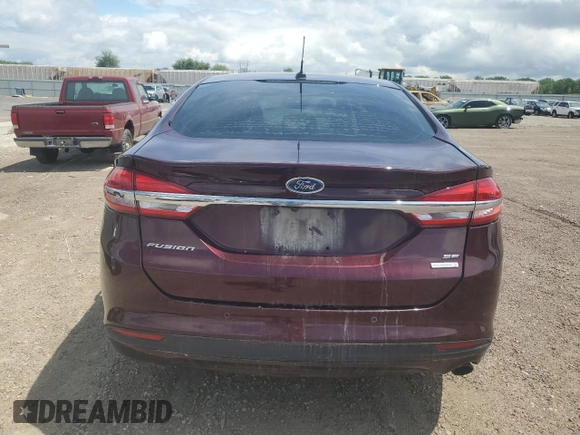 2017 Ford Fusion SE z VIN 3FA6P0HD4HR241834, wystawiony jako Copart lot #55348015 z przebiegiem 93 161 mil mil oraz Szkoda całkowita • Salvage title. Historia ofert i sprzedaży dostępna na DreamBid. Obrazek 6.