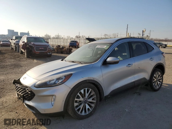 2020 Ford Escape Titanium Hybrid z VIN 1FMCU9DZ4LUC34827, wystawiony jako Copart lot #48769685 z przebiegiem 84 218 mil mil oraz Szkoda całkowita • Salvage title. Historia ofert i sprzedaży dostępna na DreamBid. Obrazek 1.