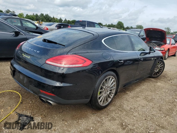 2015 Porsche Panamera S E-Hybrid z VIN WP0AD2A76FL041627, wystawiony jako Copart lot #63190924 z przebiegiem 88 860 mil mil oraz Szkody całkowita. Historia ofert i sprzedaży dostępna na DreamBid. Obrazek 3.
