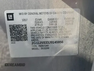 2018 Chevrolet Impala Premier z VIN 2G1125S33J9145956, wystawiony jako Copart lot #63218755 z przebiegiem Nie podano mil oraz Szkoda całkowita • Salvage title. Historia ofert i sprzedaży dostępna na DreamBid. Obrazek 12.