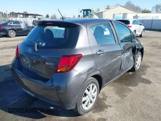 2015 Toyota Yaris L with VIN VNKKTUD34FA022251, listed as a IAAI auction lot 41435973 with 57,044 mi miles. Bid and sale history available at carsss.com. Image 4.