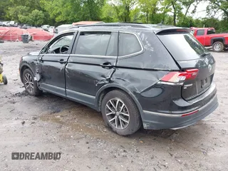 2021 Volkswagen Tiguan SE with VIN 3VV3B7AX6MM021502, listed as a IAAI auction lot 42243705 with 60,988 mi miles and . Bid and sale history available at DreamBid. Image 3.