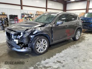 2023 Mazda CX-5 Signature with VIN JM3KFBXY6P0254862, listed as a Copart auction lot 45175855 with 4,588 mi miles and Salvage Title. Bid and sale history available at carsss.com. Image 1.