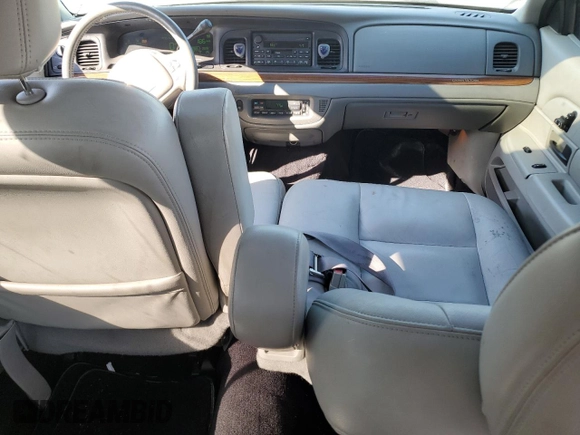 2004 Ford Crown Victoria LX z VIN 2FDFP74W34X164453, wystawiony jako Copart lot #75922204 z przebiegiem 103 546 mil mil oraz Szkoda całkowita • Salvage title. Historia ofert i sprzedaży dostępna na DreamBid. Obrazek 8.