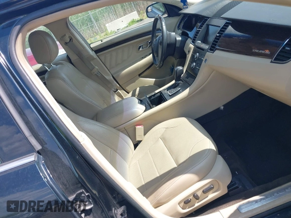 2014 Ford Taurus Limited z VIN 1FAHP2F85EG125118, wystawiony jako IAAI lot #42457437 z przebiegiem 129 406 mil mil oraz . Historia ofert i sprzedaży dostępna na DreamBid. Obrazek 5.