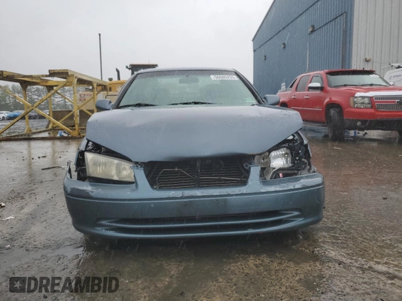 2001 Toyota Camry CE z VIN JT2BG22K710561238, wystawiony jako Copart lot #56686255 z przebiegiem Nie podano mil oraz Szkoda całkowita • Salvage title. Historia ofert i sprzedaży dostępna na DreamBid. Obrazek 5.