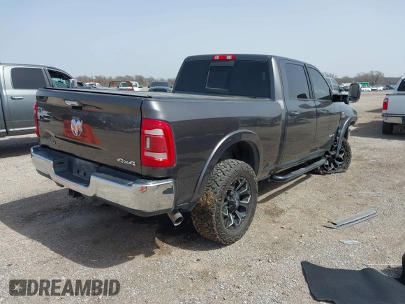 2019 Ram 2500 Laramie with VIN 3C6UR5FL2KG630341, listed as a IAAI auction lot 41742788 with 95,292 mi miles and . Bid and sale history available at DreamBid. Image 4.
