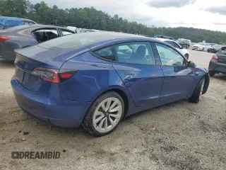 2022 Tesla Model 3 z VIN 5YJ3E1EA9NF368921, wystawiony jako Copart lot #60301705 z przebiegiem 91 048 mil mil oraz Czysty tytuł • Clean title. Historia ofert i sprzedaży dostępna na DreamBid. Obrazek 3.