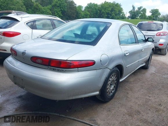 1997 Mercury Sable LS z VIN 1MELM53S5VA661602, wystawiony jako IAAI lot #42210072 z przebiegiem 106 344 mil mil oraz . Historia ofert i sprzedaży dostępna na DreamBid. Obrazek 4.