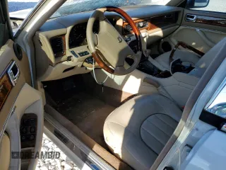 1995 Jaguar XJ with VIN SAJKX1745SC739290, listed as a Copart auction lot 82887524 with Not provided miles and Salvage title. Bid and sale history available at DreamBid. Image 8.