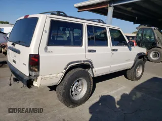 2000 Jeep Cherokee SE with VIN 1J4FF28S5YL243656, listed as a Copart auction lot 71364434 with 222,032 mi miles and Salvage Title. Bid and sale history available at carsss.com. Image 3.