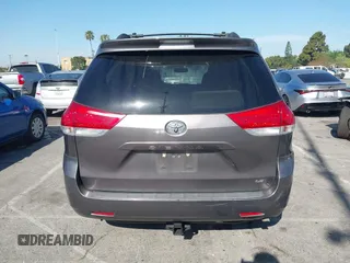 2014 Toyota Sienna LE AAS with VIN 5TDKK3DC6ES521706, listed as a IAAI auction lot 41999188 with 104,867 mi miles. Bid and sale history available at carsss.com. Image 16.