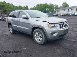 2015 Jeep Grand Cherokee Altitude with VIN 1C4RJFAG6FC170261, listed as a IAAI auction lot 42524872 with 111,802 mi miles and . Bid and sale history available at DreamBid. Image 1.