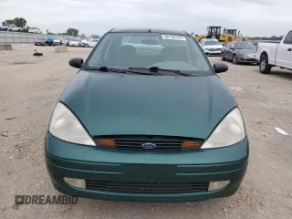 2000 Ford Focus SE z VIN 1FAFP3438YW379761, wystawiony jako Copart lot #58156125 z przebiegiem 103 816 mil mil oraz Szkoda całkowita • Salvage title. Historia ofert i sprzedaży dostępna na DreamBid. Obrazek 5.