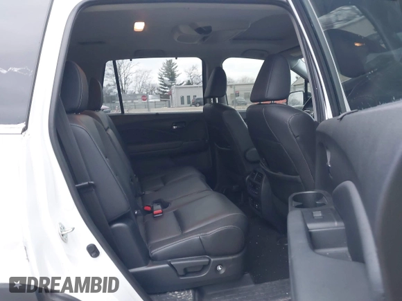 2020 Honda Pilot Touring 8-Passenger with VIN 5FNYF6H96LB056229, listed as a IAAI auction lot 41738249 with 65,099 mi miles and . Bid and sale history available at DreamBid. Image 8.
