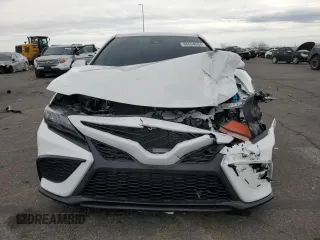 2024 Toyota Camry SE with VIN 4T1G11AK3RU844763, listed as a Copart auction lot 86654084 with 9,822 mi miles and Salvage Title. Bid and sale history available at carsss.com. Image 5.