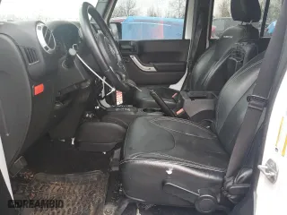 2015 Jeep Wrangler Unlimited Rubicon Hard Rock with VIN 1C4HJWFG8FL647910, listed as a Copart auction lot 46716605 with 48,139 mi miles and Salvage Title. Bid and sale history available at carsss.com. Image 7.