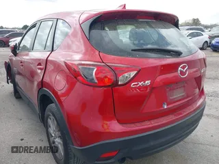 2016 Mazda CX-5 Sport with VIN JM3KE2BY9G0911535, listed as a IAAI auction lot 41906402 with 134,477 mi miles. Bid and sale history available at carsss.com. Image 3.