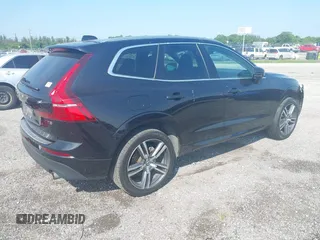 2021 Volvo XC60 Momentum z VIN YV4102DK2M1715161, wystawiony jako IAAI lot #42096448 z przebiegiem 57 784 mil mil oraz . Historia ofert i sprzedaży dostępna na DreamBid. Obrazek 4.