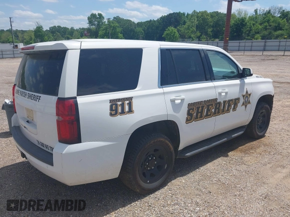 2020 Chevrolet Tahoe Commercial with VIN 1GNLCDECXLR154849, listed as a IAAI auction lot 42050778 with 124,771 mi miles and . Bid and sale history available at DreamBid. Image 4.