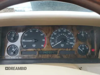 1996 Jaguar XJ with VIN SAJHX1741TC758740, listed as a Copart auction lot 73377914 with 140,964 mi miles and Salvage title. Bid and sale history available at DreamBid. Image 9.