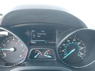 2016 Ford Escape SE with VIN 1FMCU0GXXGUB66870, listed as a IAAI auction lot 42219454 with 116,158 mi miles and . Bid and sale history available at carsss.com. Image 7.