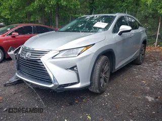 2018 Lexus RX 350 z VIN 2T2ZZMCA4JC100212, wystawiony jako IAAI lot #42197456 z przebiegiem 63 078 mil mil oraz . Historia ofert i sprzedaży dostępna na DreamBid. Obrazek 2.